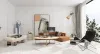 Zdjęcie na okładkę nowoczesnego salonu 3d w wersji Homestyler z rdzawą sofą w kształcie litery L, zaokrągloną kremową sofą i złotą lampą podłogową.
